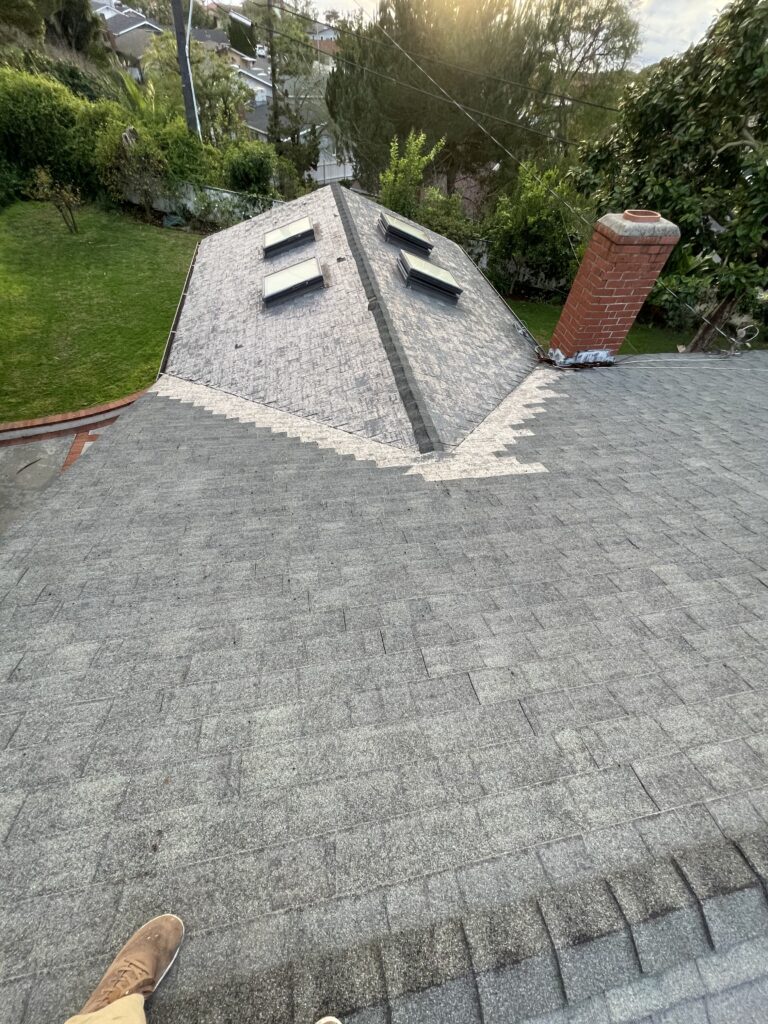 Project Overview This residential roofing project presented several challenges due to multiple previous roof repairs and the presence of several layers of aging shingles installed over the original wood shake roofing system. Over time, these layered roofing materials can conceal underlying issues, add excessive weight to the structure, and reduce the overall effectiveness of the roofing system. After a thorough inspection, Golem Roofing recommended a complete roof replacement to ensure long-term performance, structural integrity, and reliable weather protection. Project Challenges The existing roof had undergone numerous repairs throughout its lifespan, resulting in: Multiple layers of old asphalt shingles Original wood shake roofing beneath the shingle layers Increased roof weight from accumulated roofing materials Potential ventilation and performance concerns Reduced lifespan of previous roofing systems Hidden substrate conditions that could only be evaluated after removal Our Solution To provide the homeowner with a durable, long-lasting roofing system, Golem Roofing performed a complete tear-off and replacement. Scope of Work Complete removal of all existing roofing materials Tear-off down to the roof deck Inspection of the exposed roof substrate Installation of new radiant barrier roof sheathing Installation of a complete GAF roofing system Application of GAF Timberline HDZ architectural shingles Final inspection and quality assurance review Upgraded Roofing System New Radiant Barrier Sheathing Once the existing roofing materials were removed, new radiant barrier sheathing was installed to improve the roof's overall performance. Benefits include: Improved energy efficiency Reduced attic heat buildup Enhanced indoor comfort Better long-term roof system performance Increased protection for the home structure GAF Timberline HDZ Roofing System The homeowner selected the industry-leading GAF Timberline HDZ roofing system, known for its durability, wind resistance, and attractive architectural appearance. Key advantages include: Exceptional weather protection Advanced LayerLock™ technology High wind resistance Long-lasting performance Enhanced curb appeal Industry-leading manufacturer support Warranty Protection One of the most valuable aspects of this project is the comprehensive warranty coverage provided to the homeowner. Manufacturer Warranty 50-Year GAF Manufacturer System Warranty Coverage for roofing materials and system performance Protection backed by one of North America's leading roofing manufacturers Golem Roofing Workmanship Warranty 12-Year No-Leak Workmanship Warranty Coverage for installation-related issues Added confidence in the quality of workmanship Third-Party Protection $250,000 Third-Party Guarantee Additional layer of protection beyond standard warranty coverage Increased long-term peace of mind for the homeowner Project Results The completed roof replacement transformed an aging, heavily layered roofing system into a modern, high-performance roofing solution designed for decades of reliable protection. Results at a Glance ✅ Complete tear-off down to the roof deck ✅ Removal of multiple roofing layers and original wood shakes ✅ New radiant barrier sheathing installed ✅ GAF Timberline HDZ architectural shingles ✅ 50-Year GAF Manufacturer System Warranty ✅ 12-Year No-Leak Workmanship Warranty ✅ $250,000 Third-Party Guarantee ✅ Improved energy efficiency and roof performance ✅ Enhanced curb appeal and property value Conclusion Complete Roof Replacement with GAF Timberline HDZ Roofing System The homeowner now has a durable, energy-efficient roofing system designed to provide reliable protection and peace of mind for decades to come. Contractor: Golem Roofing Service: Complete Roof Replacement Roofing System: GAF Timberline HDZ Warranty: 50-Year GAF System Warranty + 12-Year No-Leak Workmanship Warranty