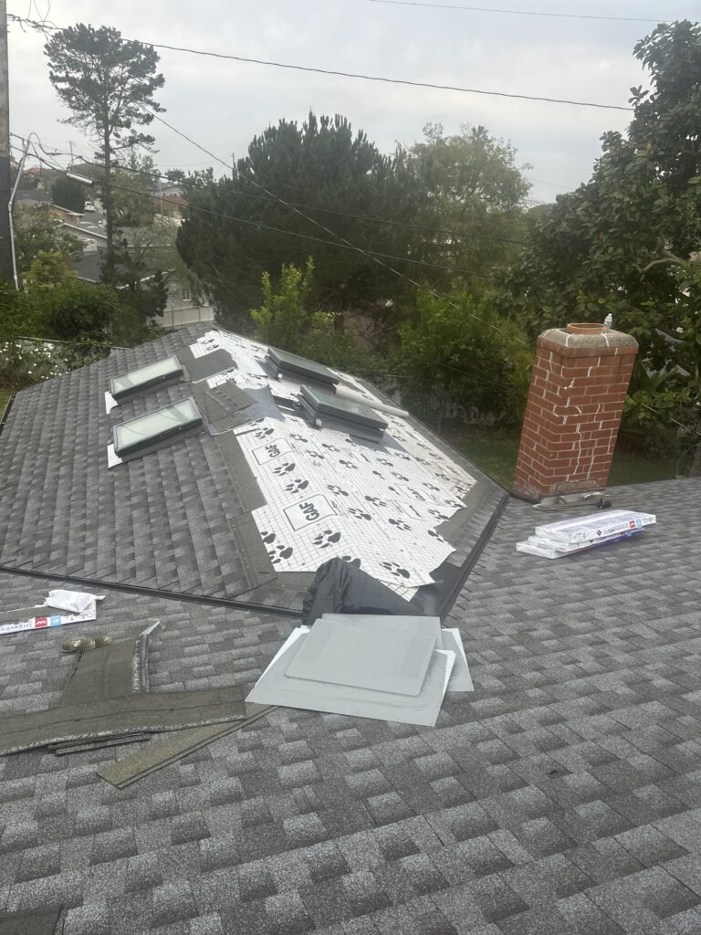 Project Overview This residential roofing project presented several challenges due to multiple previous roof repairs and the presence of several layers of aging shingles installed over the original wood shake roofing system. Over time, these layered roofing materials can conceal underlying issues, add excessive weight to the structure, and reduce the overall effectiveness of the roofing system. After a thorough inspection, Golem Roofing recommended a complete roof replacement to ensure long-term performance, structural integrity, and reliable weather protection. Project Challenges The existing roof had undergone numerous repairs throughout its lifespan, resulting in: Multiple layers of old asphalt shingles Original wood shake roofing beneath the shingle layers Increased roof weight from accumulated roofing materials Potential ventilation and performance concerns Reduced lifespan of previous roofing systems Hidden substrate conditions that could only be evaluated after removal Our Solution To provide the homeowner with a durable, long-lasting roofing system, Golem Roofing performed a complete tear-off and replacement. Scope of Work Complete removal of all existing roofing materials Tear-off down to the roof deck Inspection of the exposed roof substrate Installation of new radiant barrier roof sheathing Installation of a complete GAF roofing system Application of GAF Timberline HDZ architectural shingles Final inspection and quality assurance review Upgraded Roofing System New Radiant Barrier Sheathing Once the existing roofing materials were removed, new radiant barrier sheathing was installed to improve the roof's overall performance. Benefits include: Improved energy efficiency Reduced attic heat buildup Enhanced indoor comfort Better long-term roof system performance Increased protection for the home structure GAF Timberline HDZ Roofing System The homeowner selected the industry-leading GAF Timberline HDZ roofing system, known for its durability, wind resistance, and attractive architectural appearance. Key advantages include: Exceptional weather protection Advanced LayerLock™ technology High wind resistance Long-lasting performance Enhanced curb appeal Industry-leading manufacturer support Warranty Protection One of the most valuable aspects of this project is the comprehensive warranty coverage provided to the homeowner. Manufacturer Warranty 50-Year GAF Manufacturer System Warranty Coverage for roofing materials and system performance Protection backed by one of North America's leading roofing manufacturers Golem Roofing Workmanship Warranty 12-Year No-Leak Workmanship Warranty Coverage for installation-related issues Added confidence in the quality of workmanship Third-Party Protection $250,000 Third-Party Guarantee Additional layer of protection beyond standard warranty coverage Increased long-term peace of mind for the homeowner Project Results The completed roof replacement transformed an aging, heavily layered roofing system into a modern, high-performance roofing solution designed for decades of reliable protection. Results at a Glance ✅ Complete tear-off down to the roof deck ✅ Removal of multiple roofing layers and original wood shakes ✅ New radiant barrier sheathing installed ✅ GAF Timberline HDZ architectural shingles ✅ 50-Year GAF Manufacturer System Warranty ✅ 12-Year No-Leak Workmanship Warranty ✅ $250,000 Third-Party Guarantee ✅ Improved energy efficiency and roof performance ✅ Enhanced curb appeal and property value Conclusion Complete Roof Replacement with GAF Timberline HDZ Roofing System The homeowner now has a durable, energy-efficient roofing system designed to provide reliable protection and peace of mind for decades to come. Contractor: Golem Roofing Service: Complete Roof Replacement Roofing System: GAF Timberline HDZ Warranty: 50-Year GAF System Warranty + 12-Year No-Leak Workmanship Warranty